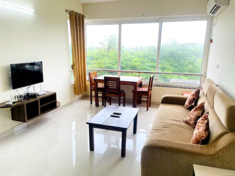 Waves Nest - Vibrant Apartment,a 1bhk with modern amenities/pool